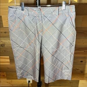 Nike Gray Golf Shorts with Orange and White Lines